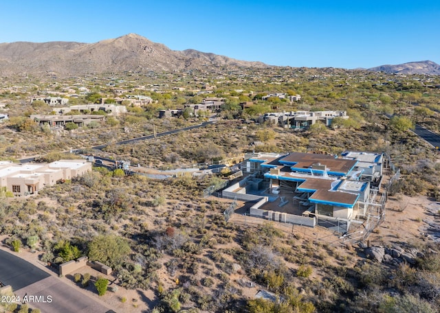 birds eye view of property featuring a mountain view