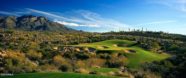 property view of mountains featuring view of golf course