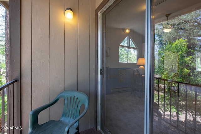 entrance to property with a balcony