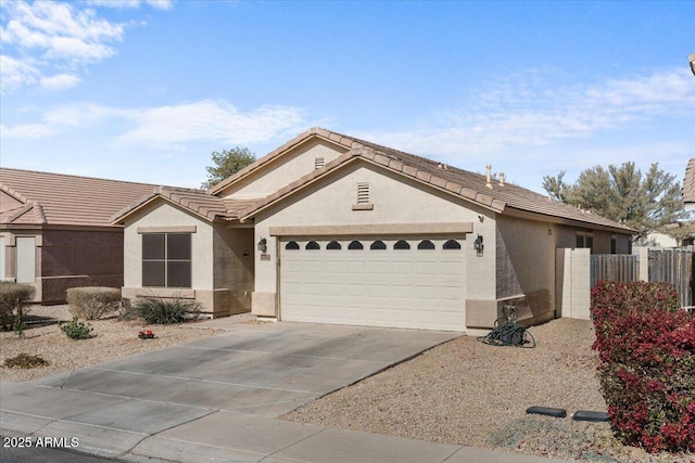 ranch-style house featuring a garage