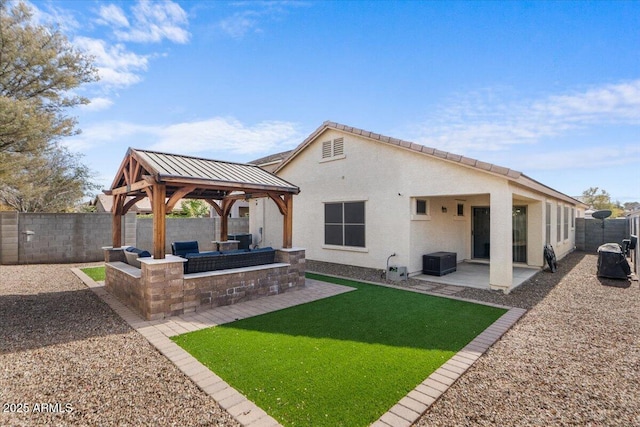 rear view of house featuring a patio area, a gazebo, and cooling unit