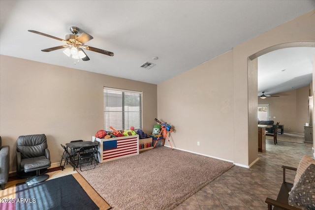 game room with ceiling fan