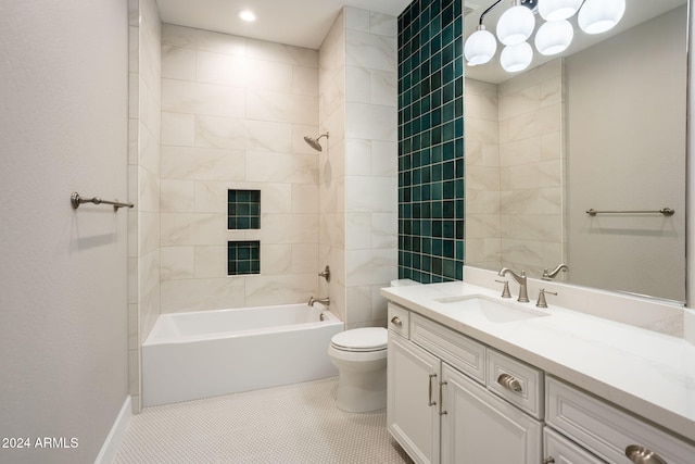 full bathroom featuring tile patterned flooring, vanity, toilet, and tiled shower / bath