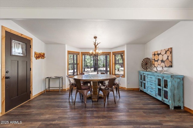 4170 Apache Dr, Happy Jack, AZ 86024 - dining area with a chandelier, baseboards, and dark wood finished floors