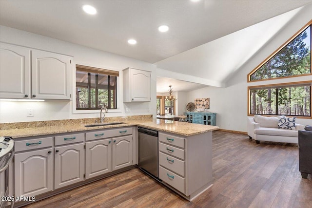 4170 Apache Dr, Happy Jack, AZ 86024 - kitchen with a sink, a peninsula, stainless steel dishwasher, open floor plan, and gray cabinetry