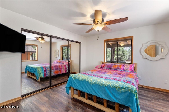 4170 Apache Dr, Happy Jack, AZ 86024 - bedroom featuring baseboards, wood finished floors, a closet, and a ceiling fan