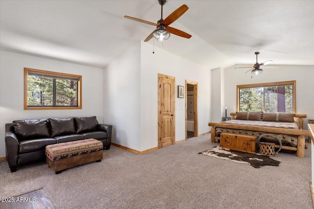 4170 Apache Dr, Happy Jack, AZ 86024 - carpeted living room featuring a ceiling fan, lofted ceiling, and baseboards