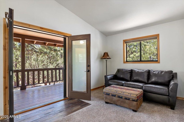 4170 Apache Dr, Happy Jack, AZ 86024 - living area with lofted ceiling, carpet, and baseboards