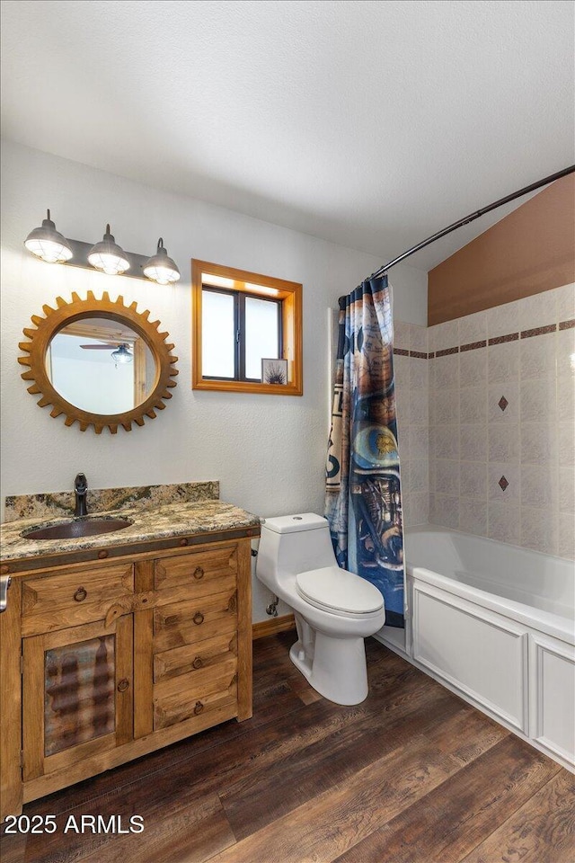 4170 Apache Dr, Happy Jack, AZ 86024 - bathroom with toilet, wood finished floors, vanity, and shower / bath combo