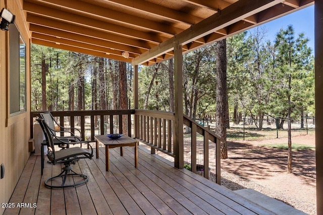 4170 Apache Dr, Happy Jack, AZ 86024 - wooden terrace with fence and view of scattered trees