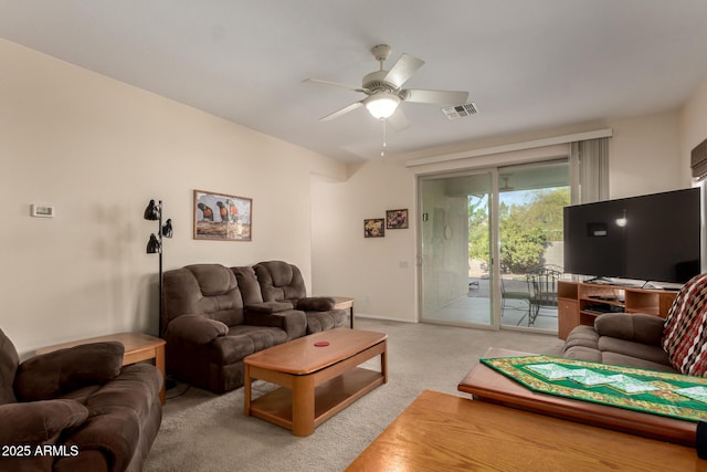 living room featuring ceiling fan