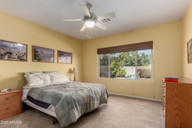 bedroom with ceiling fan and carpet flooring