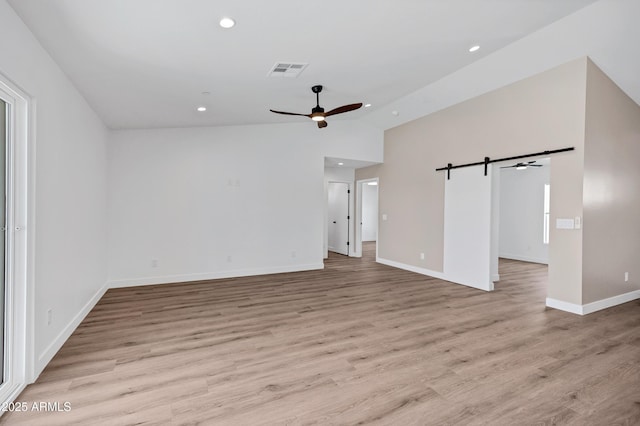 11509 W Langford Ct, Youngtown, AZ 85363 - unfurnished living room with lofted ceiling, a ceiling fan, light wood-type flooring, baseboards, and recessed lighting