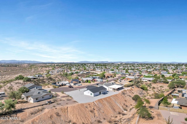 11509 W Langford Ct, Youngtown, AZ 85363 - aerial view of property and surrounding area with nearby suburban area and a mountainous background