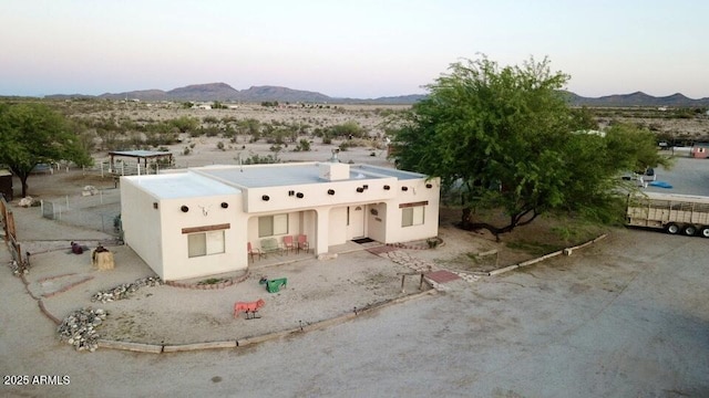 39281 Ave 61 Unit 1/2, Salome, AZ 85348 - pueblo-style home featuring a mountain view, view of desert, stucco siding, and a view of countryside