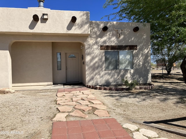 39281 Ave 61 Unit 1/2, Salome, AZ 85348 - doorway to property featuring stucco siding