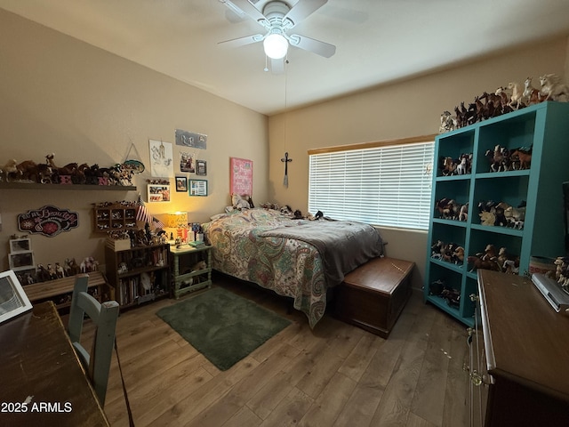 39281 Ave 61 Unit 1/2, Salome, AZ 85348 - bedroom with wood finished floors and ceiling fan
