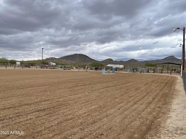 39281 Ave 61 Unit 1/2, Salome, AZ 85348 - view of yard with a mountain view and an outdoor riding arena