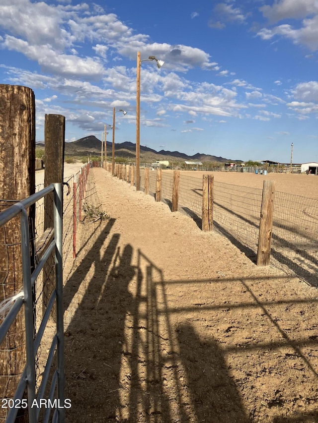 39281 Ave 61 Unit 1/2, Salome, AZ 85348 - view of yard featuring a rural view and a mountain view