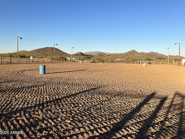 39281 Ave 61 Unit 1/2, Salome, AZ 85348 - view of yard featuring a mountain view and an enclosed riding area