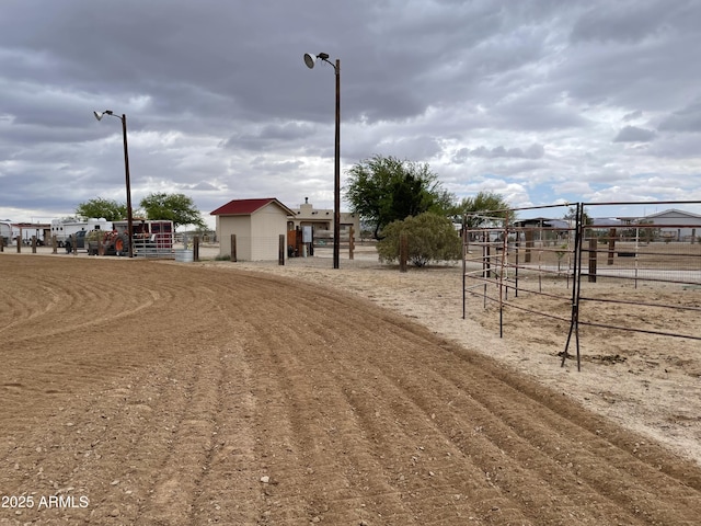 39281 Ave 61 Unit 1/2, Salome, AZ 85348 - view of dirt / gravel road featuring street lights