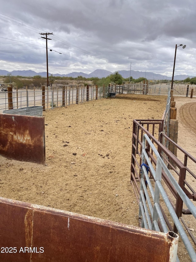 39281 Ave 61 Unit 1/2, Salome, AZ 85348 - view of yard featuring a mountain view, an enclosed riding area, and a view of countryside
