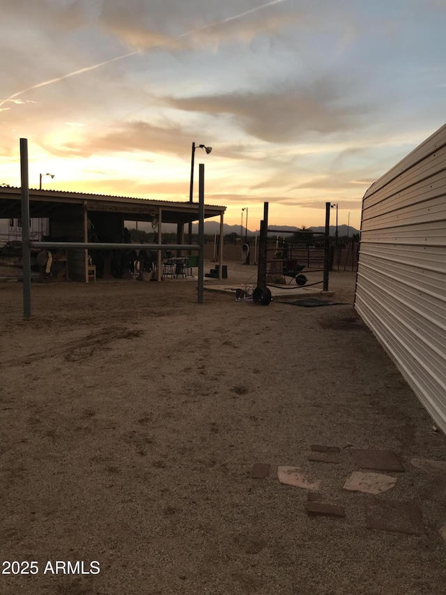 39281 Ave 61 Unit 1/2, Salome, AZ 85348 - view of yard at dusk