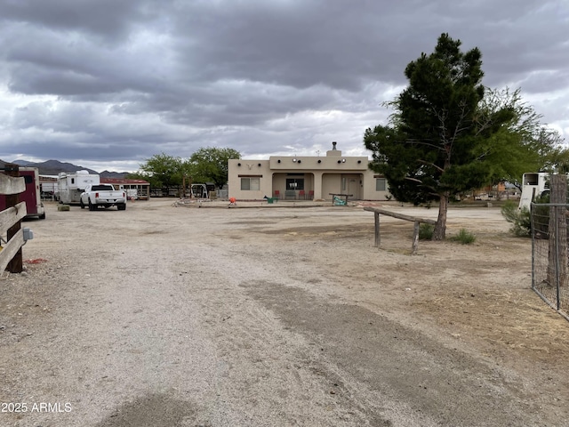 39281 Ave 61 Unit 1/2, Salome, AZ 85348 - view of dirt / gravel road with a gated entry