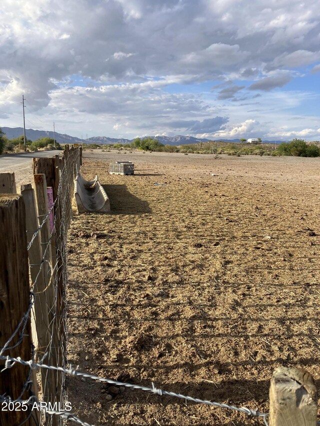 39281 Ave 61 Unit 1/2, Salome, AZ 85348 - view of yard featuring a view of rural / pastoral area and a mountain view