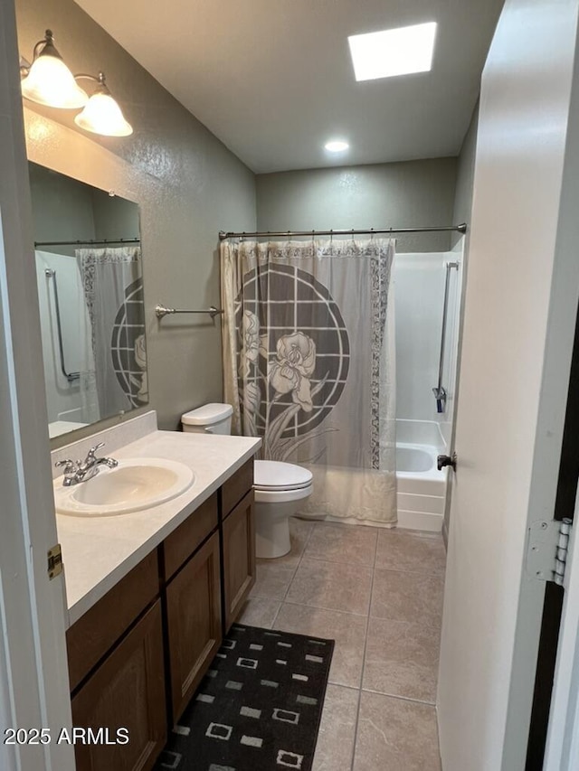 bathroom with tile patterned floors, toilet, shower / tub combo with curtain, and vanity
