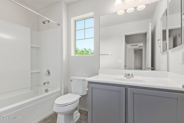 full bathroom featuring tile floors, toilet, shower / bathtub combination, and vanity