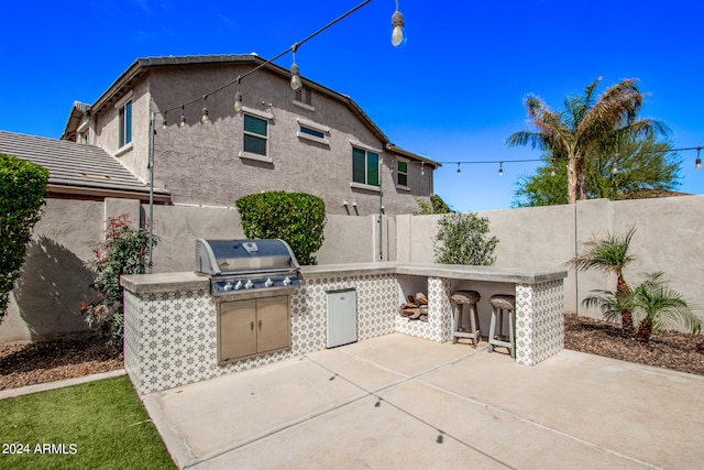 view of patio with a grill and area for grilling