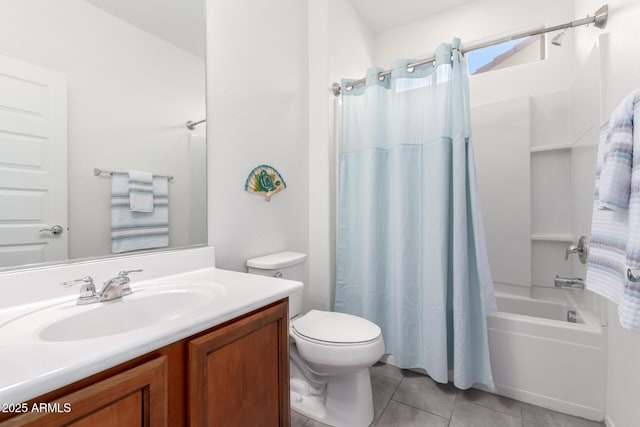 full bathroom featuring toilet, vanity, tile patterned flooring, and shower / bath combo with shower curtain