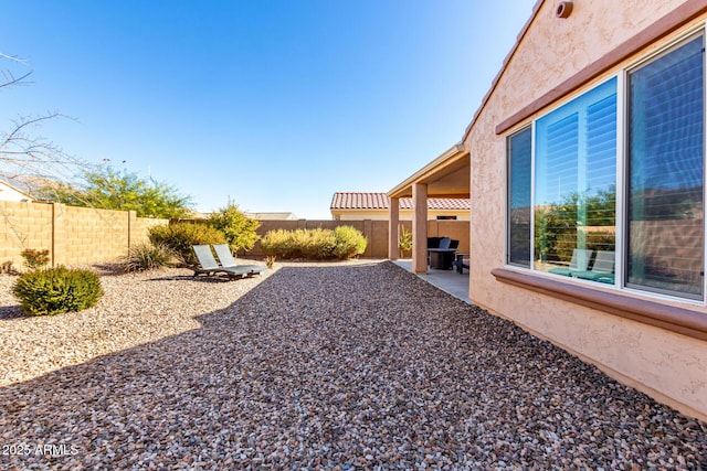 view of yard with a patio area