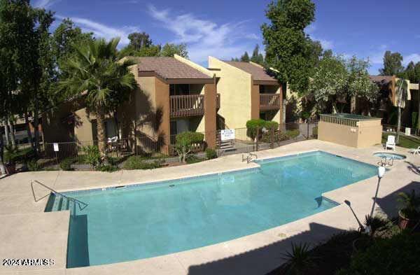 view of swimming pool featuring a patio