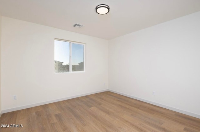 empty room featuring light hardwood / wood-style floors