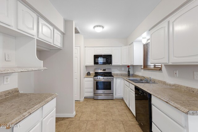 kitchen featuring white cabinets, sink, and black appliances