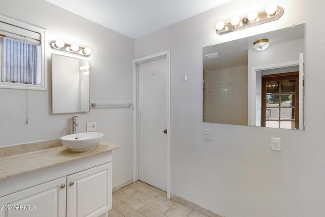 bathroom featuring vanity and tile patterned floors