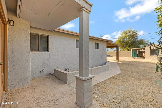 exterior space with a patio