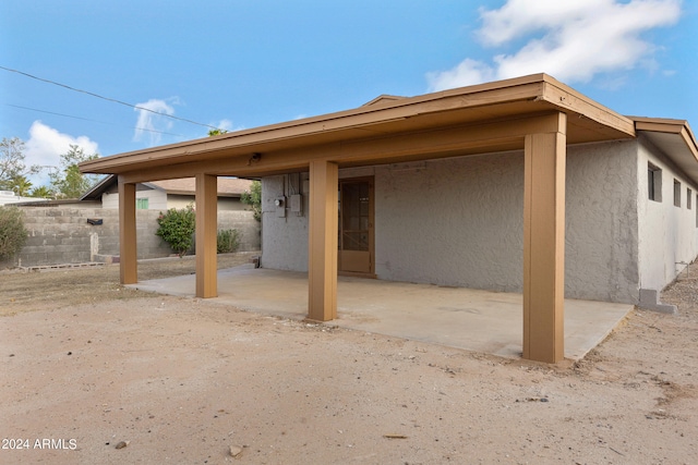 rear view of property with a patio