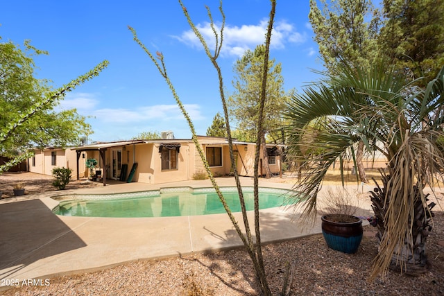 outdoor pool featuring a patio area