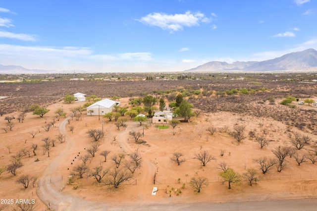 mountain view featuring a desert view and a rural view