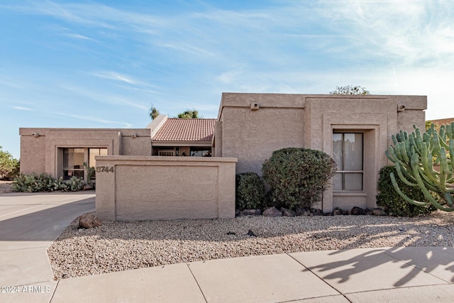 view of pueblo revival-style home