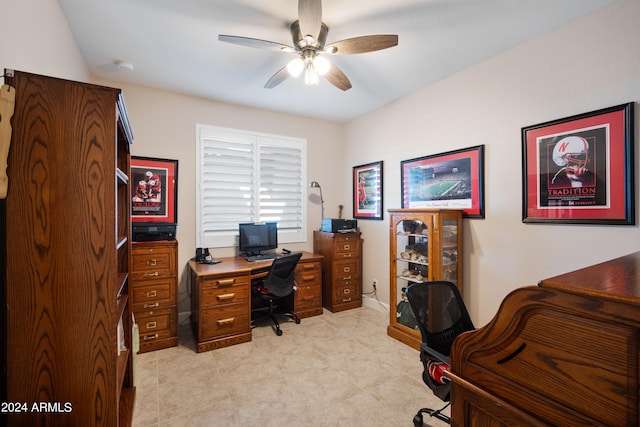 tiled home office with ceiling fan