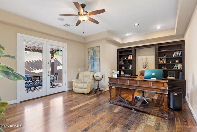 home office with wood finished floors, french doors, and a ceiling fan