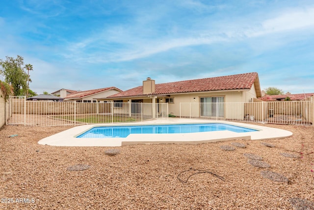 view of pool with a fenced in pool, a patio, and a fenced backyard