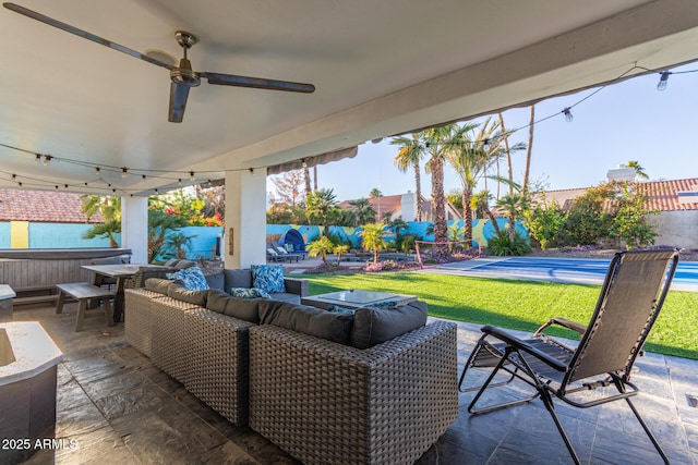 view of patio with a pool with hot tub and outdoor lounge area