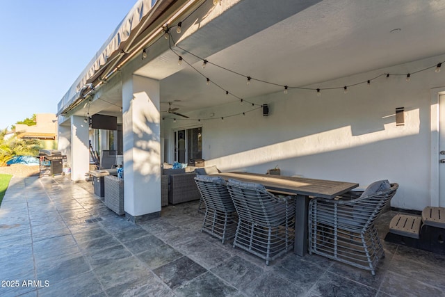 view of patio featuring ceiling fan and area for grilling