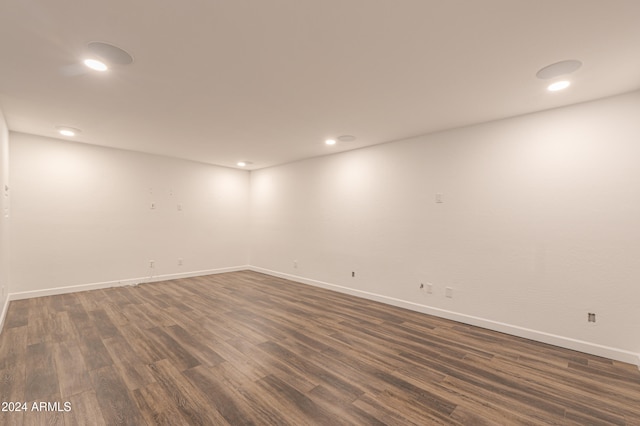 empty room featuring dark hardwood / wood-style flooring