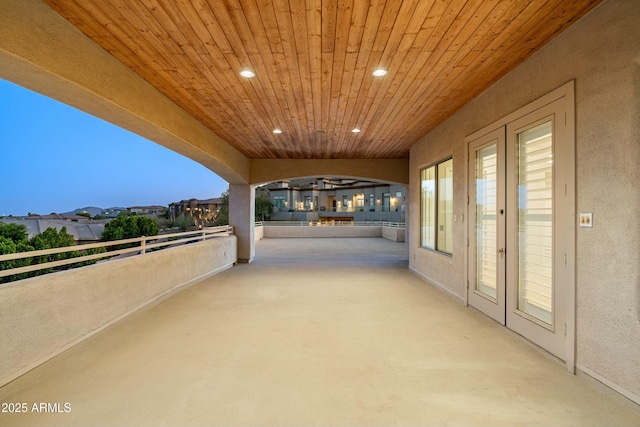 patio terrace at dusk with a balcony